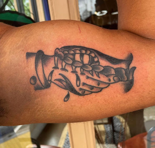 Explore bookish tattoo ideas, creative tattoo ideas in Tampa, available at HAWKS ELECTRIC TATTOOS