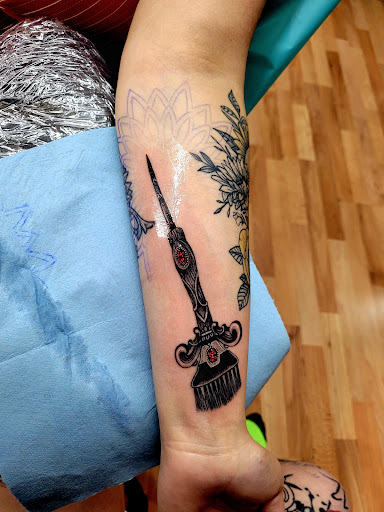 Explore leg tattoo ideas men, creative tattoo ideas in Benton, available at Spectrum Tattoo