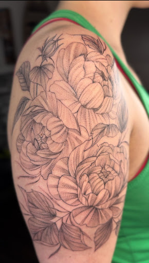 Find tattoo under breast ideas for your next unique tattoo in Vancouver at Sacred Yeti Tattoos