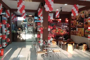 Asha's Cafe and Restaurant image