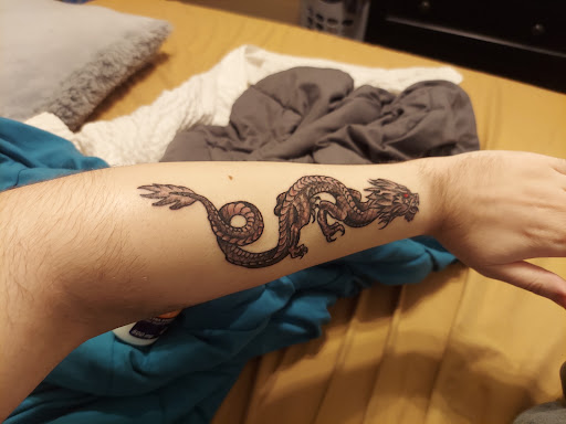 Explore tattoos of basketballs for ideas, creative tattoo ideas in Virginia Beach, available at World Famous Blue Horseshoe Tattoo and Piercing Independence
