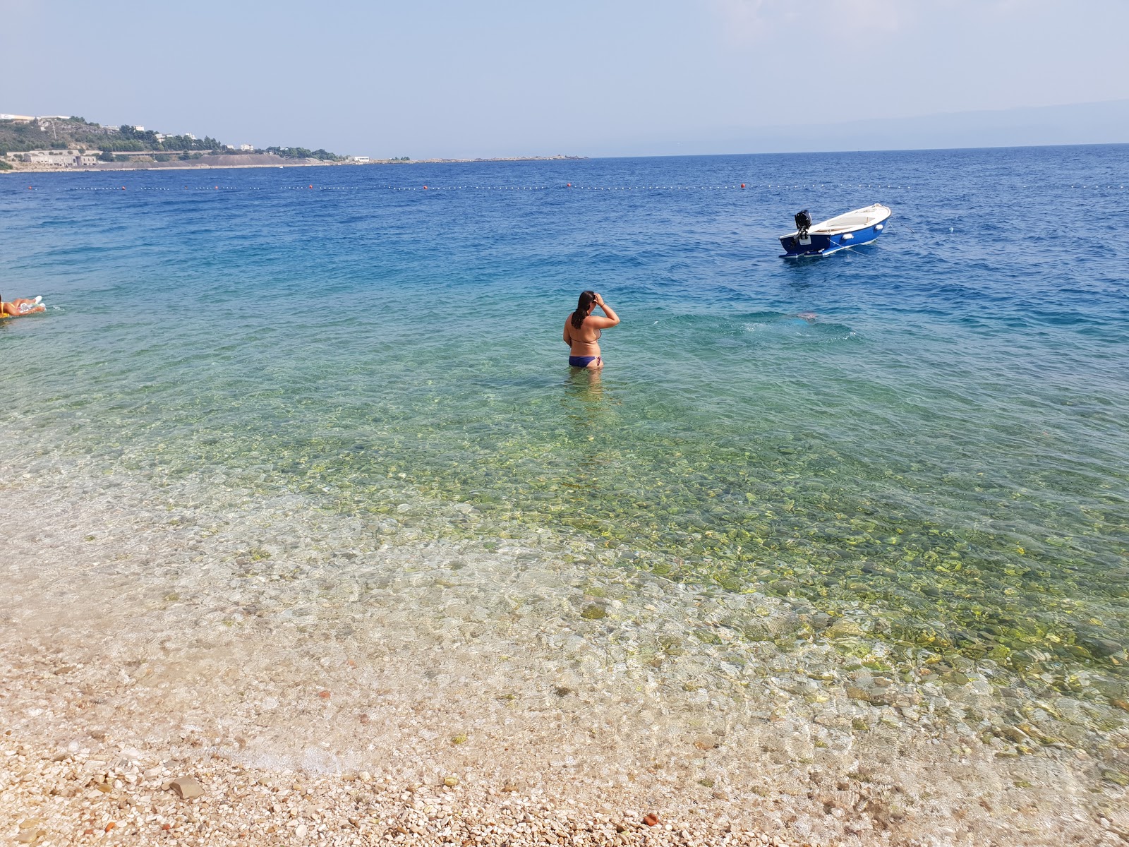 Plaza Dugi Rat III'in fotoğrafı birden fazla geniş koy ile birlikte