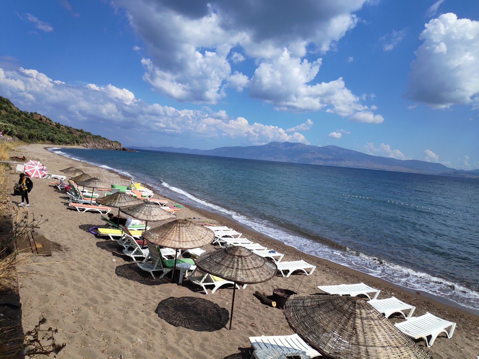 Foto von Neverland Camp beach mit heller kies Oberfläche