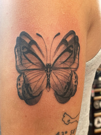 Explore fine line tattoo ideas for females, creative tattoo ideas in Chapel Hill, available at Golden Falcon Tattoo and Piercing