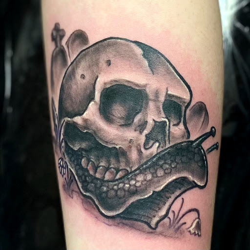 Explore leg tattoo idea for men, creative tattoo ideas in Helena, available at Velvet Rose Tattoo