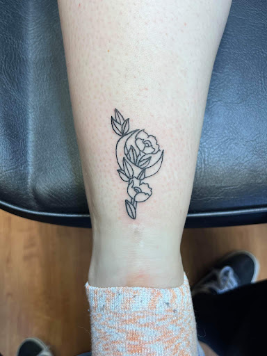 Find angel tattoo ideas for guys for your next unique tattoo in Williamston at Inkd Tattoo Parlor