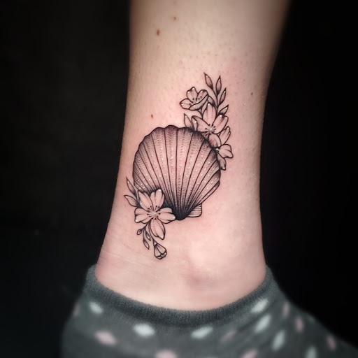 Explore cute dog tattoos ideas, creative tattoo ideas in Stevens Point, available at International Ink Tattoos