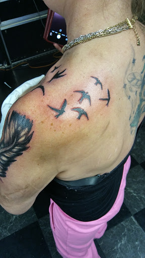 Explore cuff tattoo ideas, creative tattoo ideas in Big Spring, available at A Mom & Pop Tattoo Shop