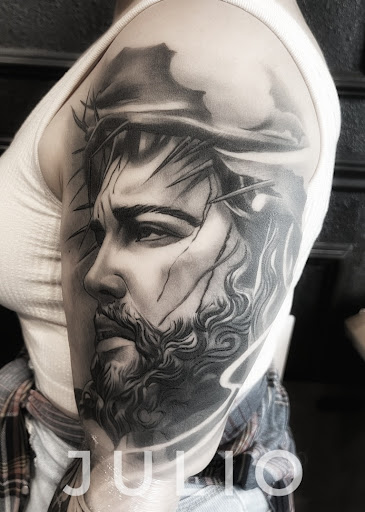 Explore rock n roll tattoo ideas, creative tattoo ideas in Downey, available at Dotta Ink Tattoo & Piercing Parlour