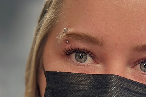 Explore sun tattoo ideas for men, creative tattoo ideas in Chicago, available at IRIS Piercing Studio and Jewelry Gallery