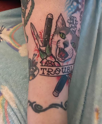 Explore 2003 tattoo ideas, creative tattoo ideas in Orange Park, available at Fantasy Tattoo and Piercing