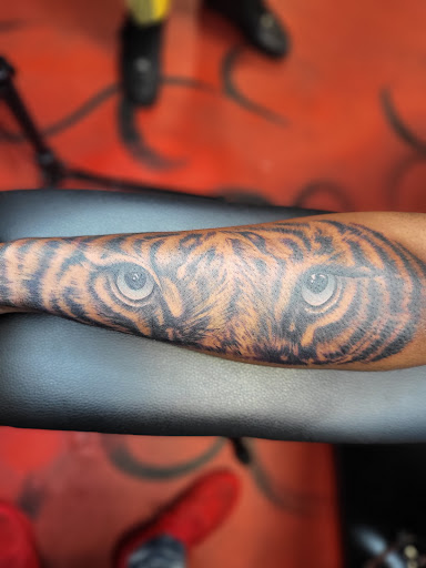 Explore chrome tattoo ideas, creative tattoo ideas in Stuart, available at Kenny Tats Inkcorporated