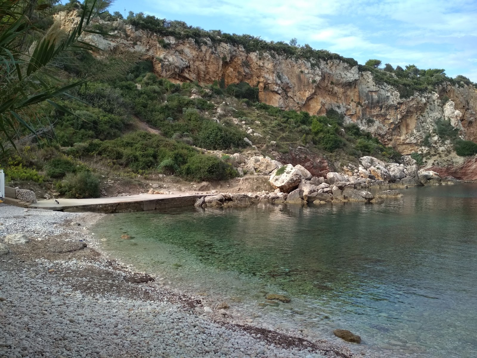 Spiaggia Cala Rossa'in fotoğrafı - tatil için iyi evcil hayvan dostu nokta