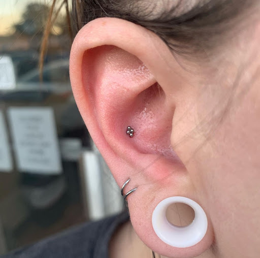 Explore wrap tattoo ideas, creative tattoo ideas in Atlanta, available at Virtue and Vice Body Piercing