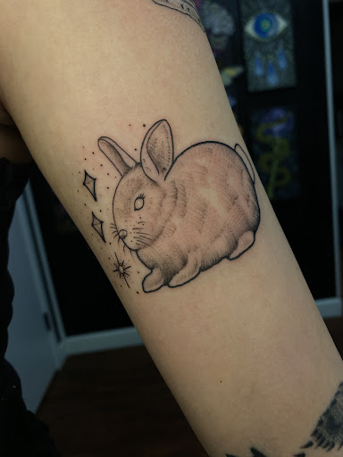 Find underboob tattoo idea for your next unique tattoo in Red Bank at Resilient Visions