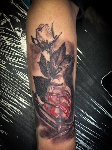 Explore tattoo son ideas, creative tattoo ideas in Moweaqua, available at Fleshwound Tattoo