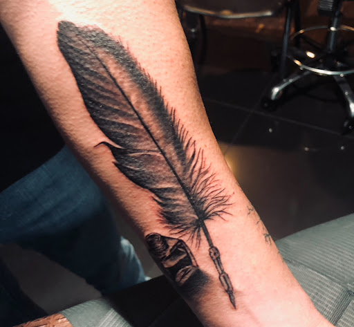 Explore hand tattoos ideas for men, creative tattoo ideas in Webster, available at Mainline Ink