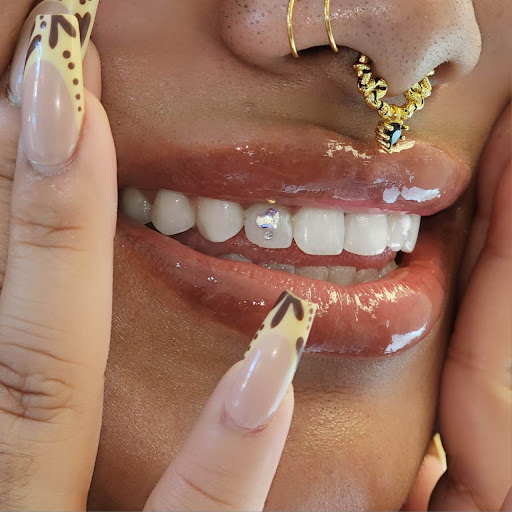 Explore cool hand tattoo ideas, creative tattoo ideas in Orange, available at Baron Art Tattoo