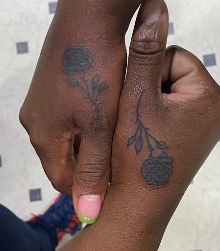 Explore women's lower back tattoo ideas, creative tattoo ideas in Evansville, available at Ink Therapy 101