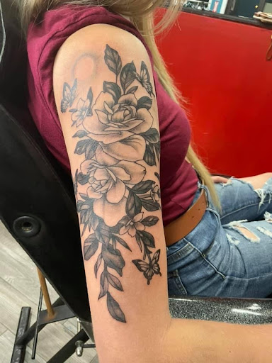 Explore chest tattoo filler ideas, creative tattoo ideas in Mineola, available at Kiss of Death Ink