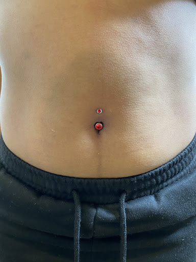 Explore men's dark tattoo ideas, creative tattoo ideas in Trumbull, available at Karma Piercing