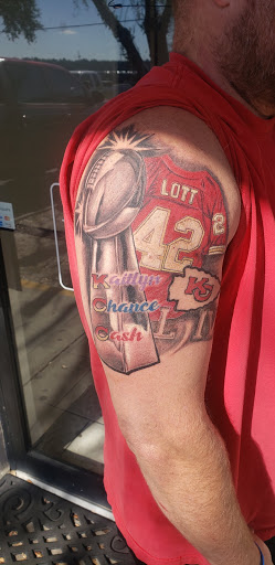 Explore good omens tattoo ideas, creative tattoo ideas in Ocoee, available at Slaughterized Ink Tattoo and Piercing Studio