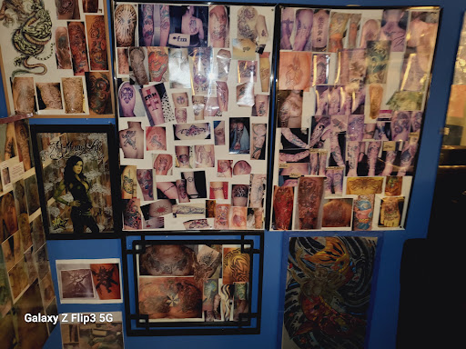 Explore excalibur tattoo ideas, creative tattoo ideas in Englewood, available at The Original Big Daddy Tattoo & Body Piercing est.1997 est.1997