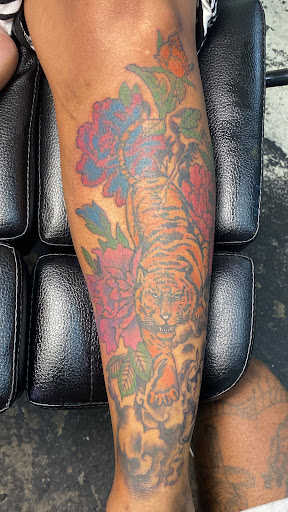 Explore tramp stamp cover up tattoo ideas, creative tattoo ideas in Jacksonville, available at Renegade Art Studio LLC