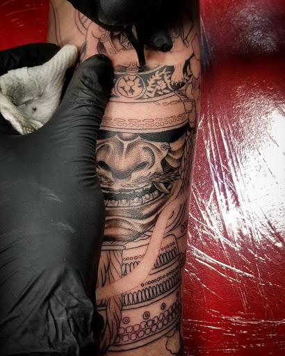 Explore front neck tattoo ideas, creative tattoo ideas in Anchorage, available at SDITATTOO, LLC