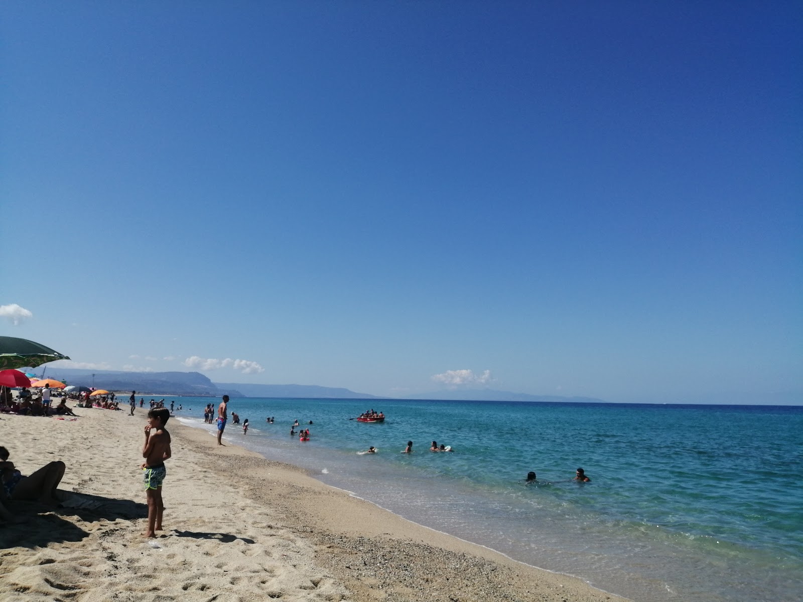 Spiaggia San Ferdinando'in fotoğrafı parlak ince kum yüzey ile
