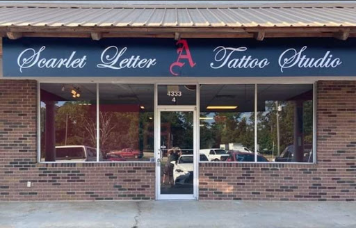 Explore dragon tattoo ideas for women, creative tattoo ideas in Valdosta, available at Scarlet Letter Tattoo Studio