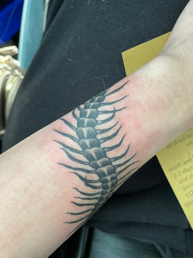 Explore hand tattoo ideas man, creative tattoo ideas in Hinesville, available at Dark Horse Art Studios