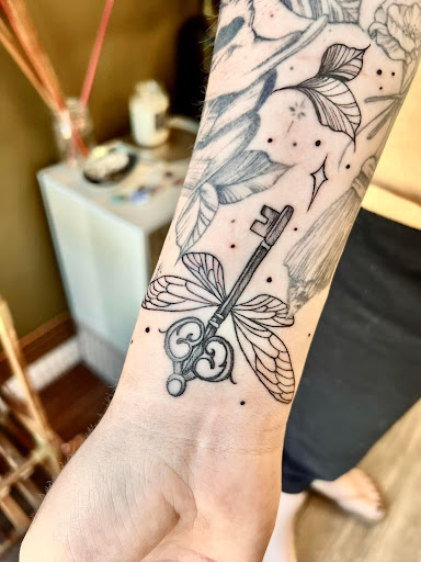 Explore tattoo ideas of strength, creative tattoo ideas in Batavia, available at The Pretty Pin-Up Tattoo Parlor