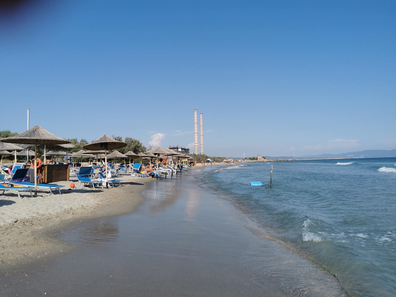 Photo of Spiaggia degli with gray fine pebble surface