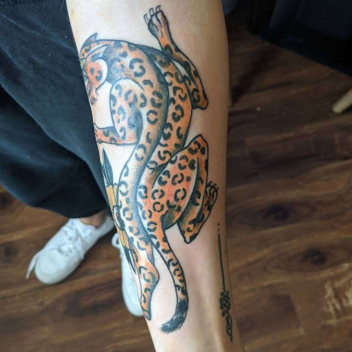 Explore leg tattoo ideas, creative tattoo ideas in Lawrence, available at Standard Electric Tattooing