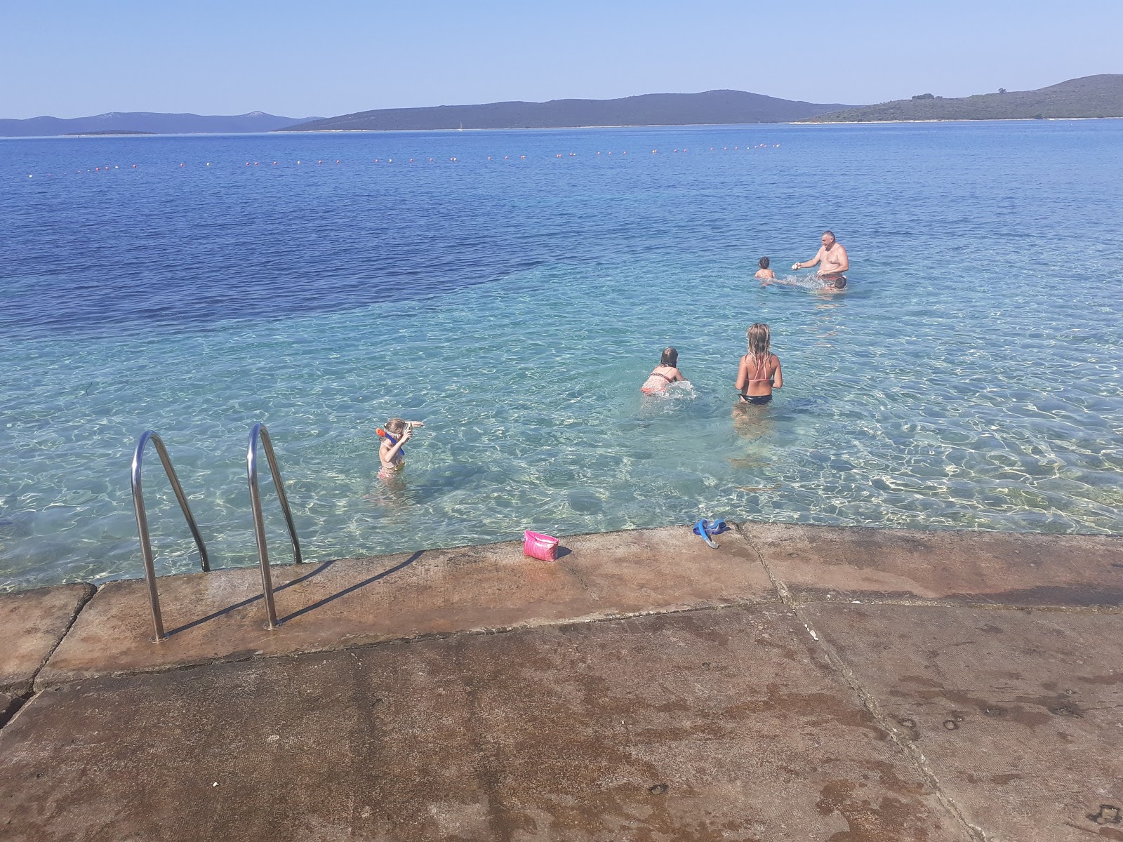 Foto von Muline Ugljan beach mit betondeckung Oberfläche