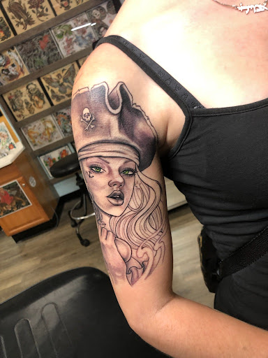 Explore butterfly and flower tattoo ideas, creative tattoo ideas in Hampton, available at Ancient Art Tattoo Studio