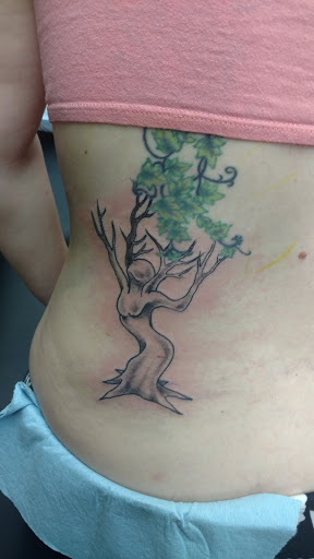 Explore love symbol tattoo ideas, creative tattoo ideas in Coeur D Alene, available at Jojos Tattoo & Body Piercing