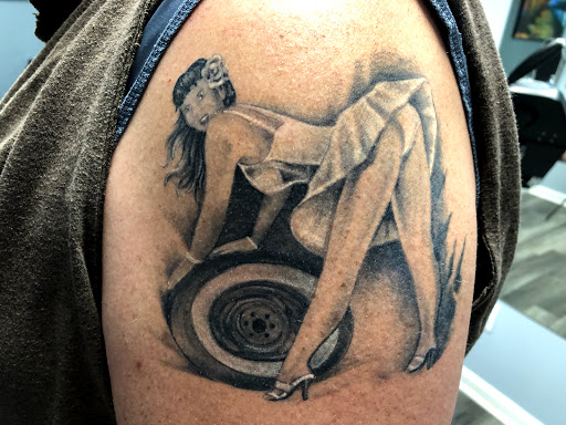 Explore globe tattoo ideas, creative tattoo ideas in Greenfield, available at Tattoos In Time Studio