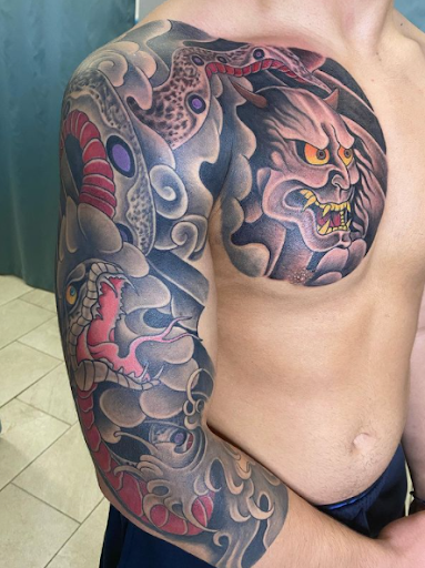 Explore dog print tattoo ideas, creative tattoo ideas in Passaic, available at District 36 Tattoo Parlor