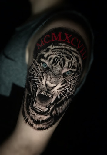 Explore cherry blossom tree tattoo ideas, creative tattoo ideas in Corona, available at Crop Circles Tattoo Studio