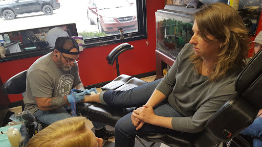 Explore back of forearm tattoo ideas, creative tattoo ideas in Southport, available at Inklanation Custom Tattoos