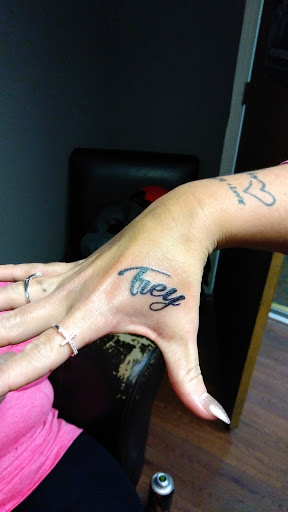 Find tropical flower tattoo ideas for your next unique tattoo in Bessemer City at Twisted Ink