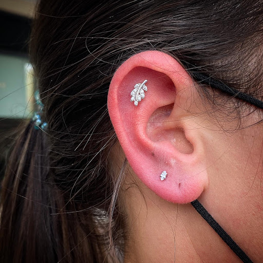 Find tattoo ideas for men stars for your next unique tattoo in Cary at Fine Art Body Piercing By Lilith Mae