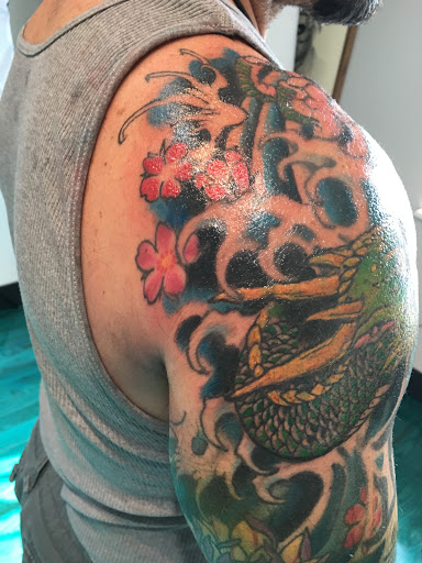 Explore tattoo ideas black male, creative tattoo ideas in Reno, available at Aces Tattoo