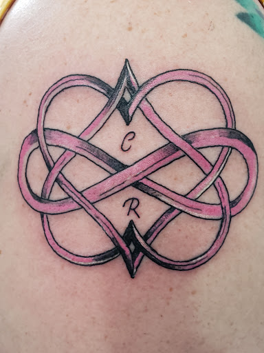 Explore world tattoo ideas, creative tattoo ideas in Martinsburg, available at Cherry Bomb Tattoo