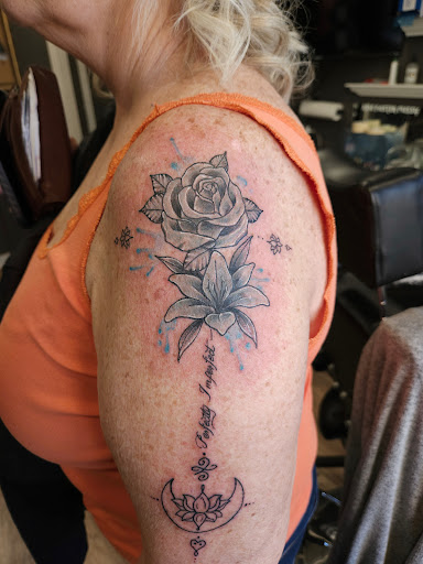 Explore belly button tattoo ideas, creative tattoo ideas in Sheridan, available at Beard N Lady Tattoo