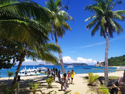 Cu Lao Cham Beach'in fotoğrafı geniş bir kıyı şeridi ile birlikte