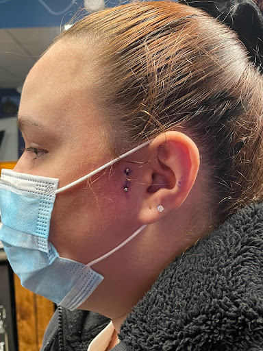 Explore ripped tattoo ideas, creative tattoo ideas in Amsterdam, available at Spoken Hand Tattoo