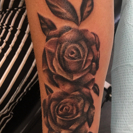 Explore tattoo ideas for country guys, creative tattoo ideas in Pigeon Forge, available at Black Orchid Tattoo Studio